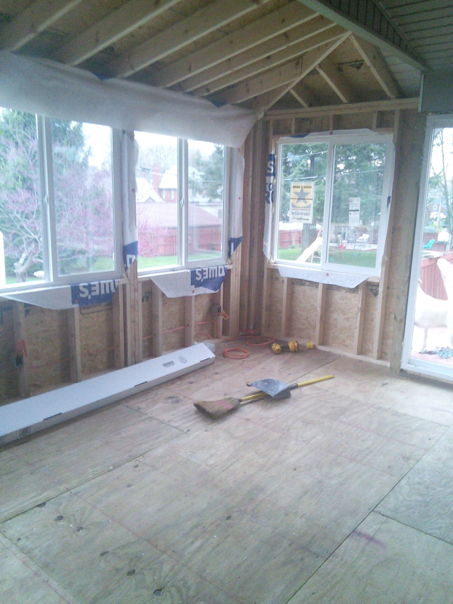 Interior framing with new window openings in place.